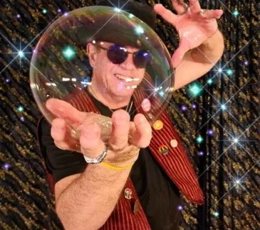 Rondini holding a big bubble in his hand