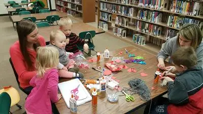 kids and adults crafting