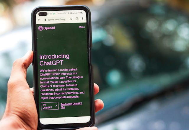 Webpage of ChatGPT is seen on the website of OpenAI, on a smartphone.
